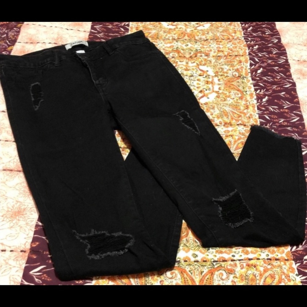 Black distressed Refugee brand jeans